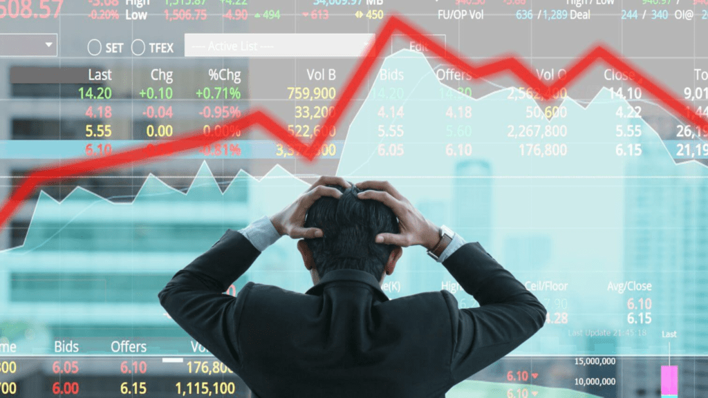 Investor analyzing stock chart showing portfolio loss